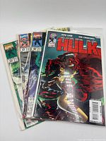 Stack of five bagged Hulk comics, top issue Hulk Vol.2 #15