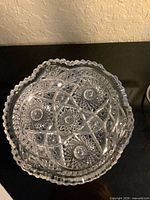 Top view of cut crystal bowl showing sawtooth edge and pattern