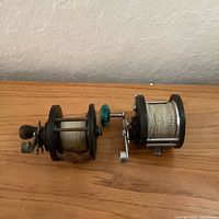 Both Penn reels side by side, spool removed from 285