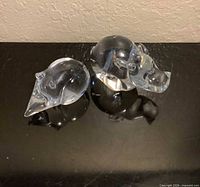 hippopotamus and hedgehog glass paperweights top view