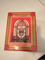 Front of retail box showing jukebox image and branding
