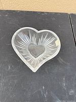 Top view of clear glass heart bowl showing starburst pattern