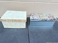 Both Max Studio decorative storage boxes closed showing exteriors