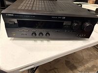 Front view of Yamaha RX-V596 showing controls and connectors