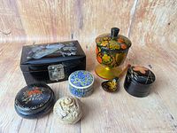 Group shot of all six boxes and spoon