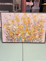 Full view of framed abstract yellow floral painting