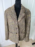 Front view of brown tweed blazer on mannequin