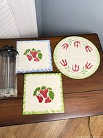 Lot overview showing frother and three trivets