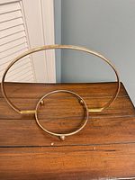 Front view showing upright hoop and lower ring platform