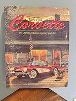 Front dust jacket showing title and Corvette illustration