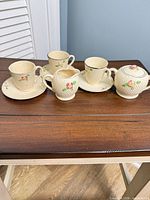 Full view of tea set pieces on table