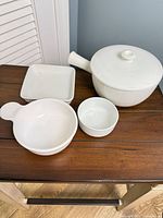 Group shot showing all four white ceramic pieces