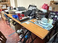 Overall view of both veneer doors used as tabletop on sawhorses