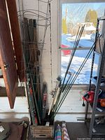 Entire grouping of stakes, posts, cages and crate