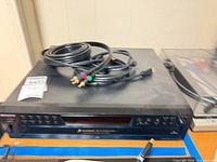 Top view of Sony CDP-CE275 with cables on top