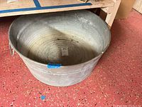 Full view of galvanized tub on floor