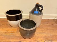 Three stoneware vessels grouped