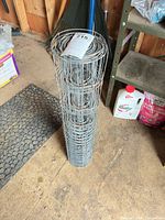 Full view of standing roll of welded wire fencing
