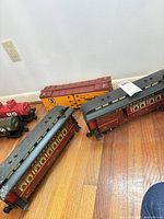 Group view of two Pennsylvania cars and SFRD boxcar