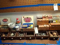 overview of drawer unit, boxes, and loose hardware