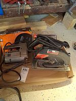 Both Craftsman saws side by side on workbench