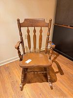Full view of wooden rocking chair