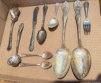 All ten pieces laid flat in box