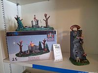 Boxed Fishing Lesson display and standalone Great Wall climbing scene