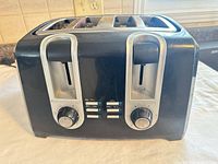 Front view showing dual controls and branding