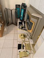 Overall lot showing screen, two boxed tool sets, and loose brass tool components