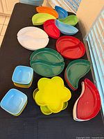 All pieces arranged on table showing colors and shapes