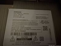 Samsung rear label showing model and specs