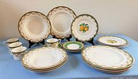 Assorted Mikasa Lemon Twist dinnerware arranged on table