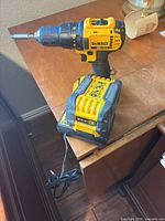Drill-driver with charger and battery