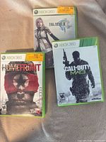 Front covers of all three Xbox 360 games