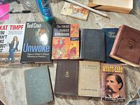 Overview of all nine books on tabletop