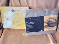 Miracle Made sheet set package beside California Design Den duvet cover box
