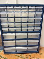 Front view of stacked organizer showing drawer configuration and color