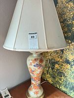 Full lamp with shade showing tag and base