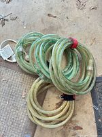 Coiled LED rope lights showing connectors and tubing coloration