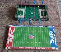 NFL Super Bowl football field and foosball table overview