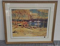 Full view of framed print showing image, mat and gold frame