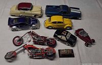 Group shot of all nine die-cast vehicles