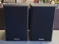 Front view of both Paradigm speakers with grills attached