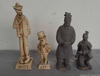 Front view of all four figurines