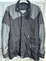 Front view of BMW Modern Concept jacket hanging