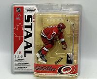 Front view of sealed Eric Staal figure in blister packaging