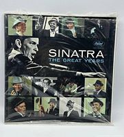 Front of trifold album showing title, photos, and Capitol logo