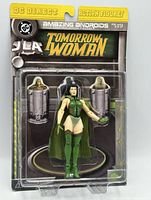 Front view of sealed Tomorrow Woman figure in packaging