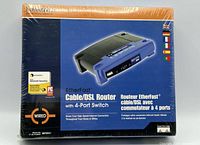 Front of sealed Linksys BEFSR41 router box